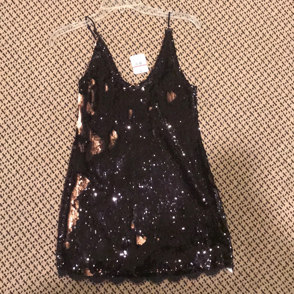 NWT Free people sequin tunic size large $98